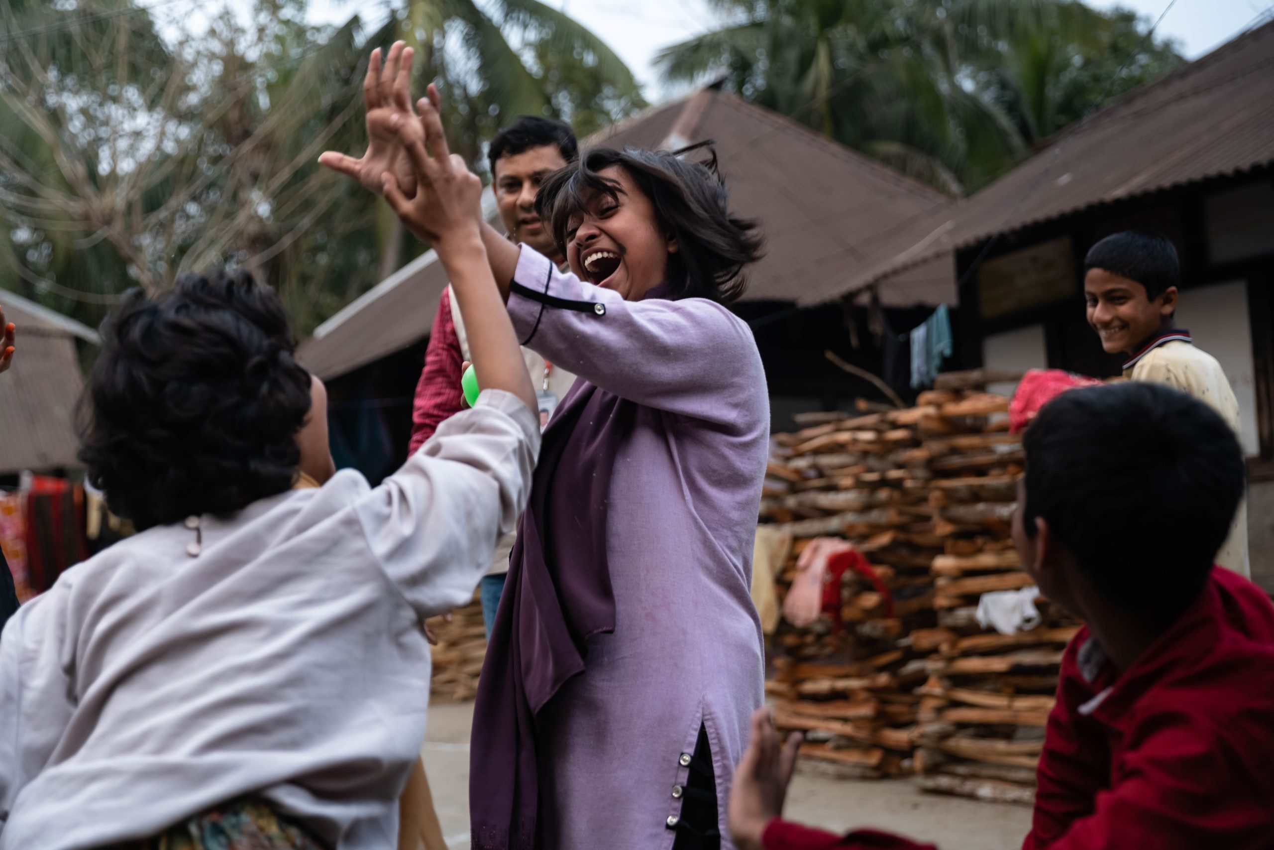 CH11331973_Tasmiya, 13, high-fiving her friend